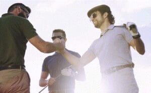 Two men giving each other a high five.